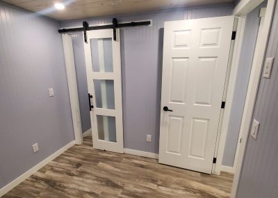 Tiny House with Painted Walls and Barn Door
